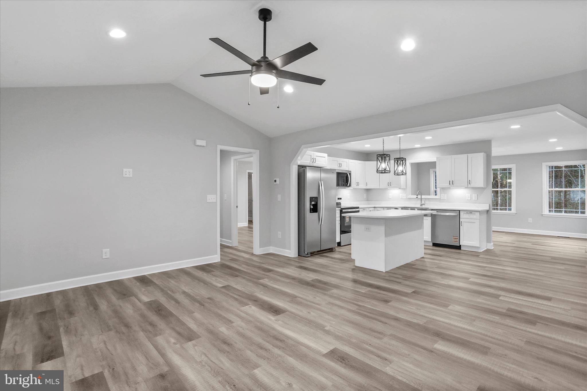 200 Wagon Trail Berkeley Springs, WV 25411 - Photo 48 of 53 a view of a kitchen with a sink and dishwasher a kitchen view with wooden floor