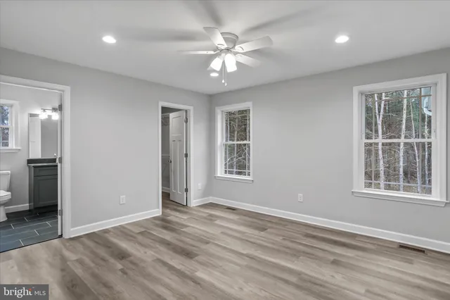 a bathroom with a sink and vanity