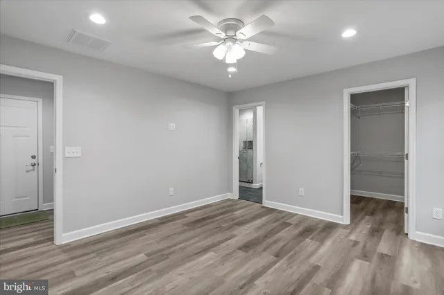 a view of a room with racks on the wall