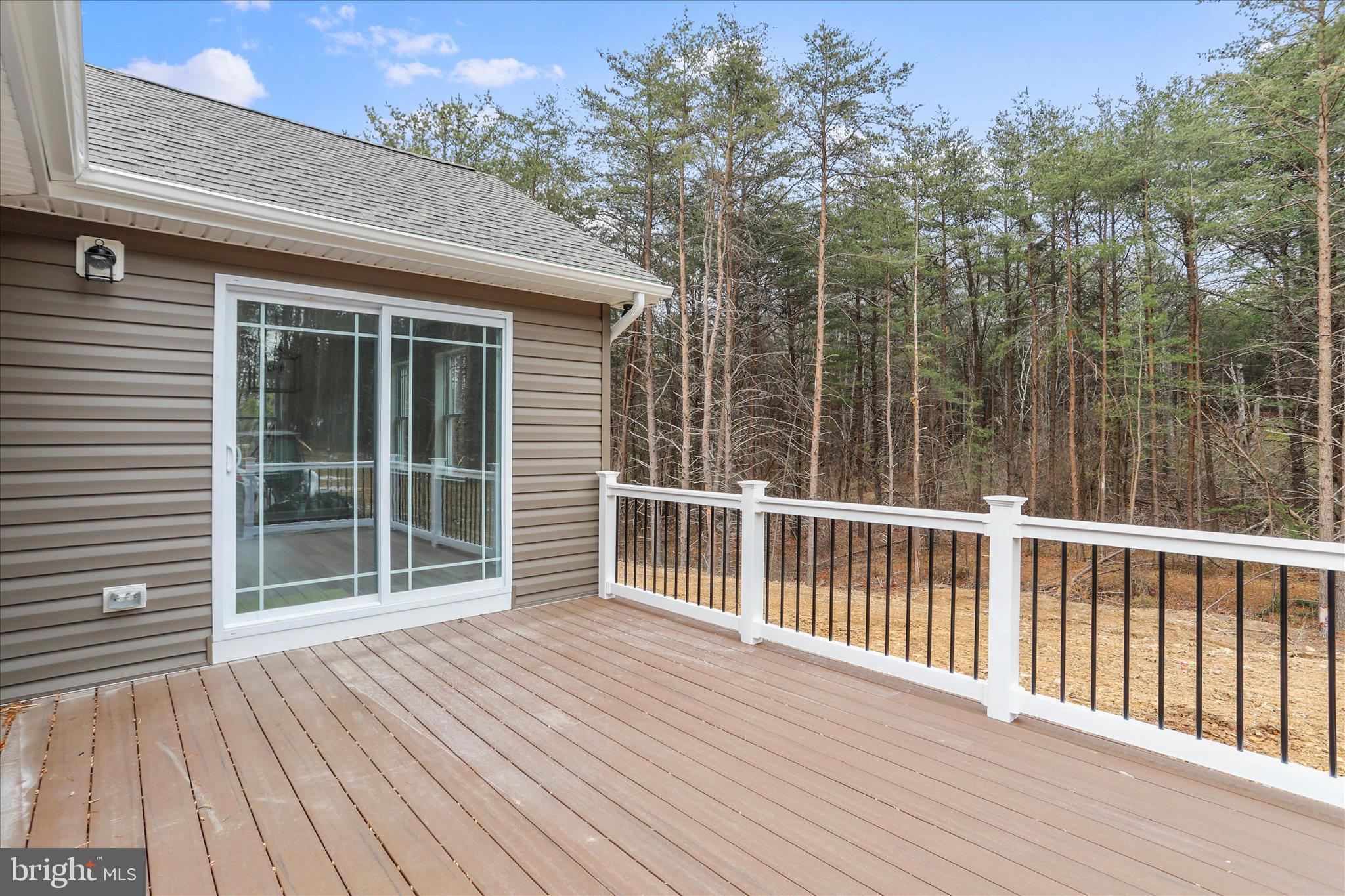 200 Wagon Trail Berkeley Springs, WV 25411 - Photo 5 of 53 a view of a wooden deck