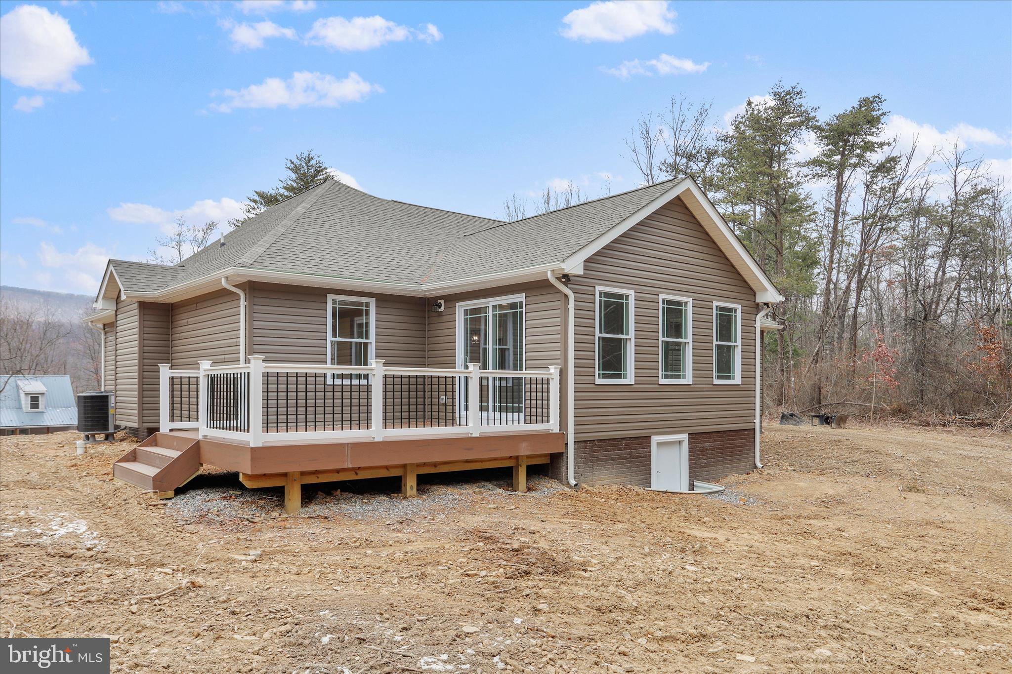 200 Wagon Trail Berkeley Springs, WV 25411 - Photo 6 of 53 a house view with a garden space