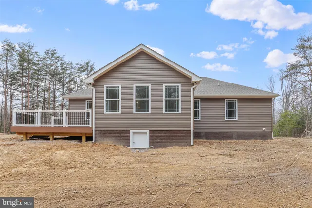 a house view with a backyard space