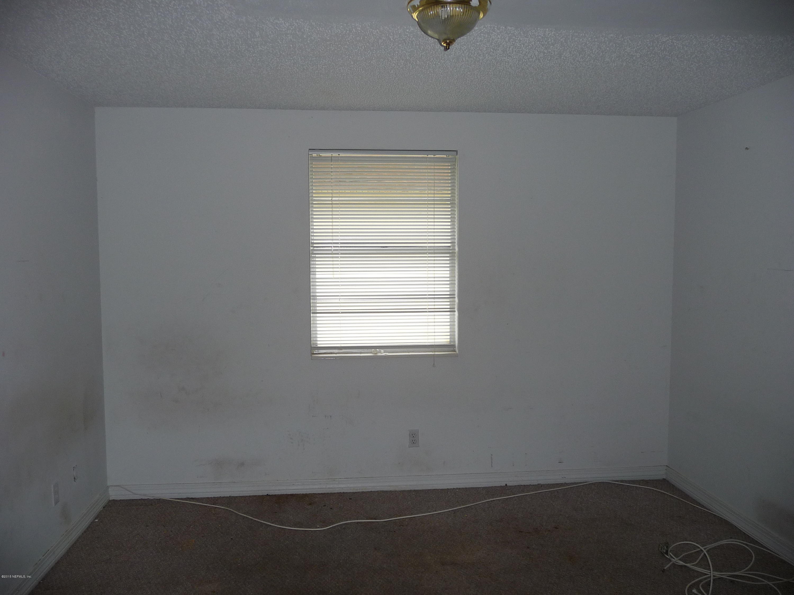 1540 El Prado Road, Unit 3 Jacksonville, FL 32216 - Photo 8 of 11 an empty room with a window