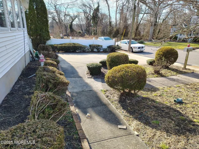 a view of a backyard of the house
