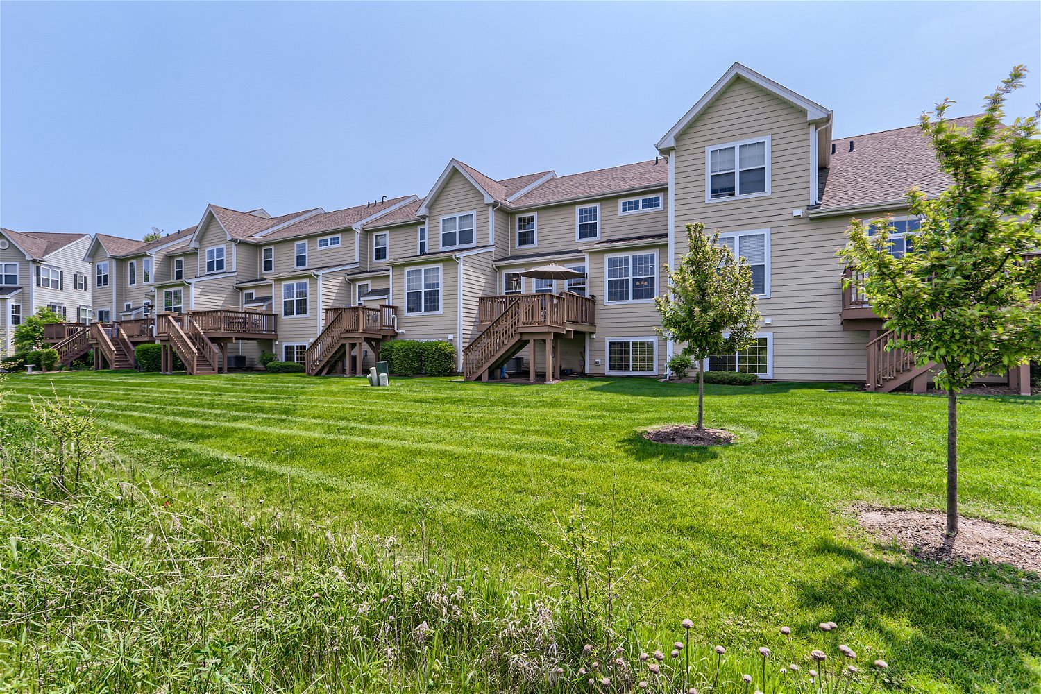 1239 Falcon Ridge Drive Elgin, IL 60124 - Photo 26 of 28 a front view of a house with a yard and green space
