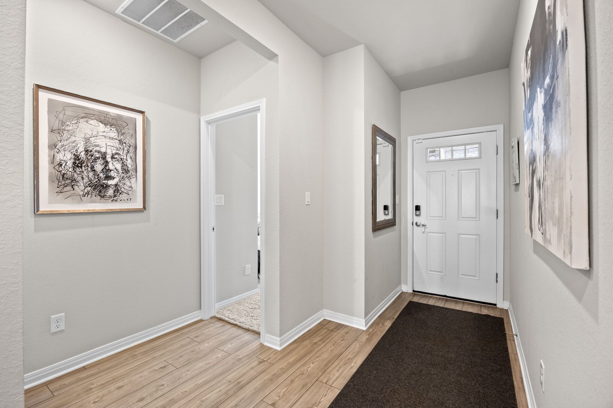 2856 Moyer Lane Round Rock, TX 78665 - Photo 14 of 27 Foyer featuring light wood-style floors and baseboards