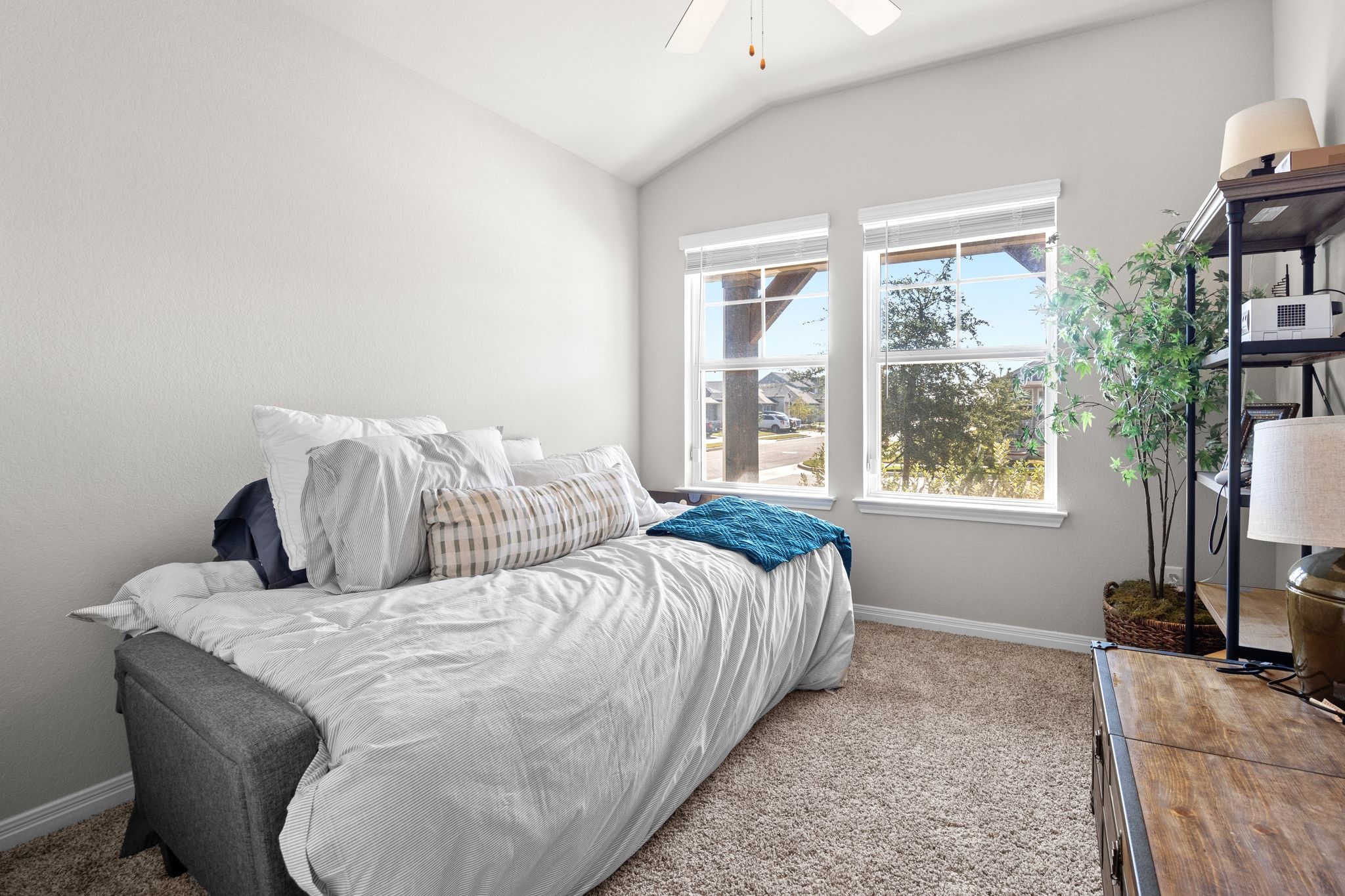 2856 Moyer Lane Round Rock, TX 78665 - Photo 15 of 27 Bedroom with lofted ceiling, carpet, and ceiling fan