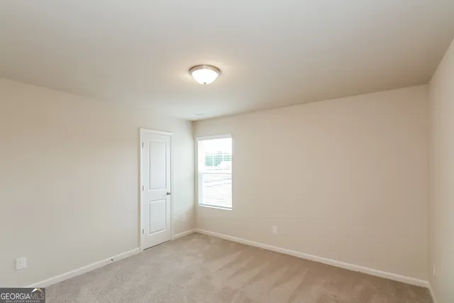 a bathroom with a sink a shower and a mirror