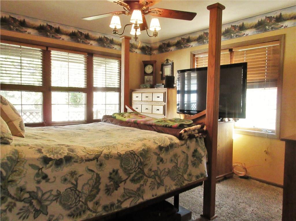 823 Sarver Road Sarver, PA 16055 - Photo 14 of 25 The 13x12' third bedroom has gorgeous natural light, plus a lighted ceiling fan and closet. This could be used as the main level master bedroom.