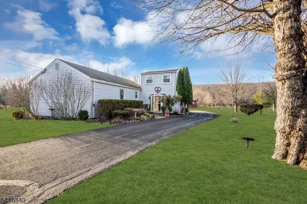a house view with a garden space