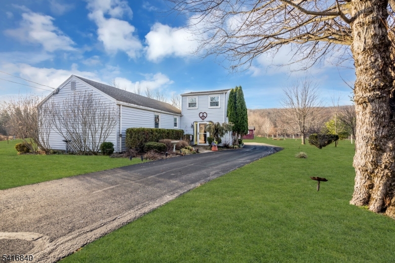 a house view with garden space