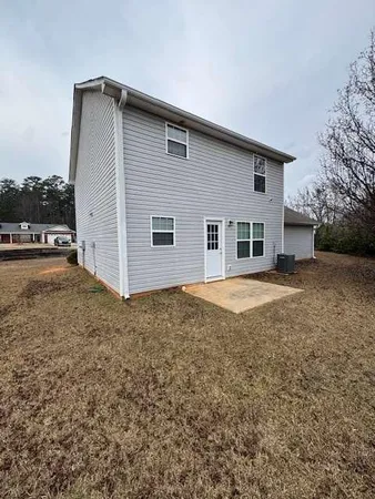 a house view with a outdoor space