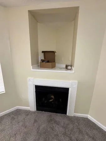 a room with a fireplace