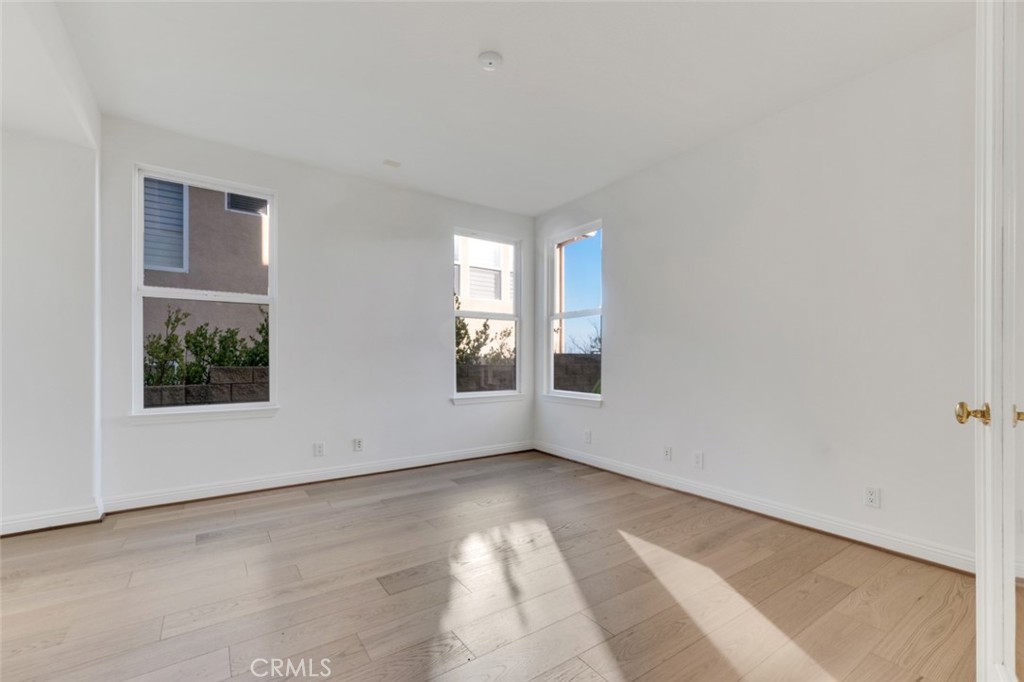 20212 Vía Medici Porter Ranch, CA 91326 - Photo 21 of 61 an empty room with windows