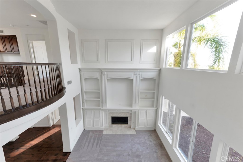 20212 Vía Medici Porter Ranch, CA 91326 - Photo 28 of 61 a view of a livingroom with a fireplace