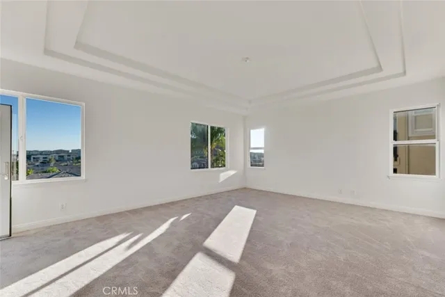 a view of hallway with windows