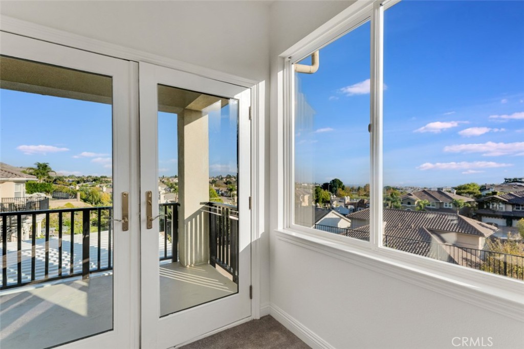 20212 Vía Medici Porter Ranch, CA 91326 - Photo 35 of 61 a view of a living room and balcony