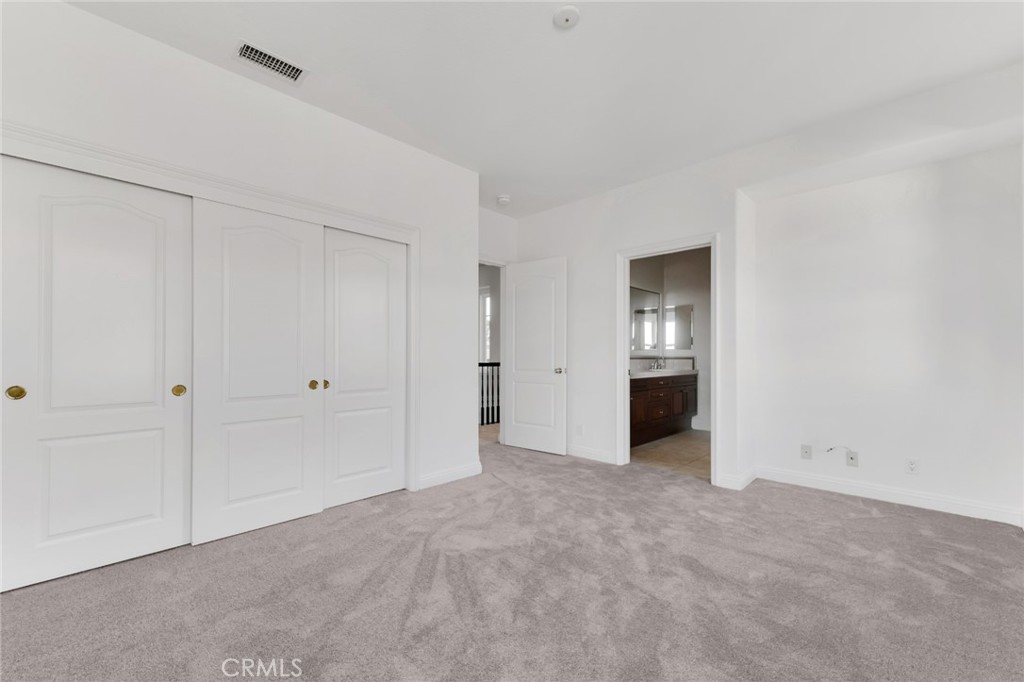 20212 Vía Medici Porter Ranch, CA 91326 - Photo 47 of 61 a view of an empty room and window