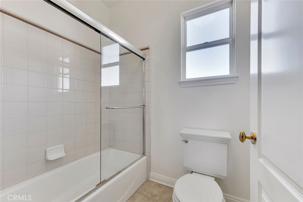 20212 Vía Medici Porter Ranch, CA 91326 - Photo 49 of 61 a bathroom with a toilet and a bathtub