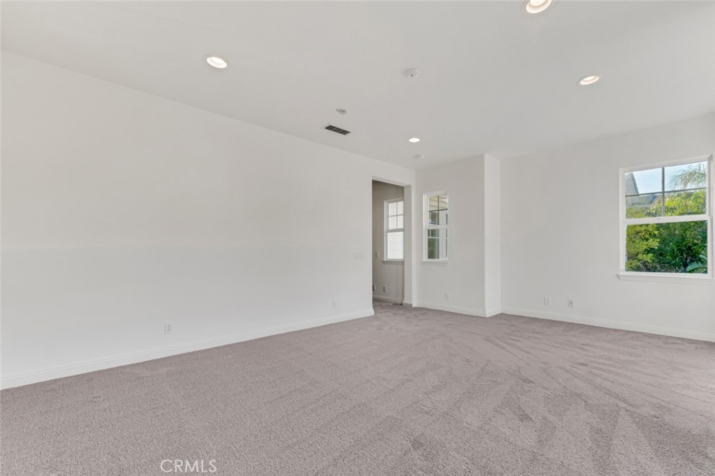 20212 Vía Medici Porter Ranch, CA 91326 - Photo 52 of 61 a view of an empty room with a window