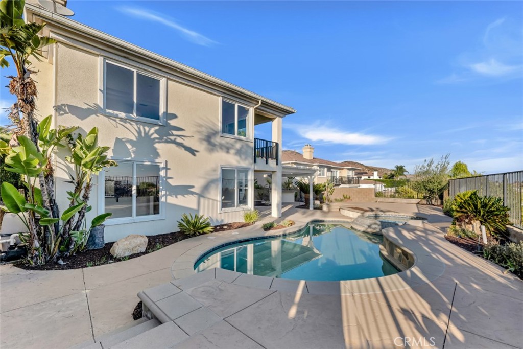 20212 Vía Medici Porter Ranch, CA 91326 - Photo 56 of 61 a view of a house with a swimming pool