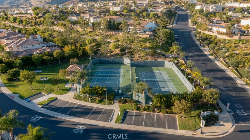 20212 Vía Medici Porter Ranch, CA 91326 - Photo 60 of 61 an aerial view of a house with yard swimming pool and outdoor seating
