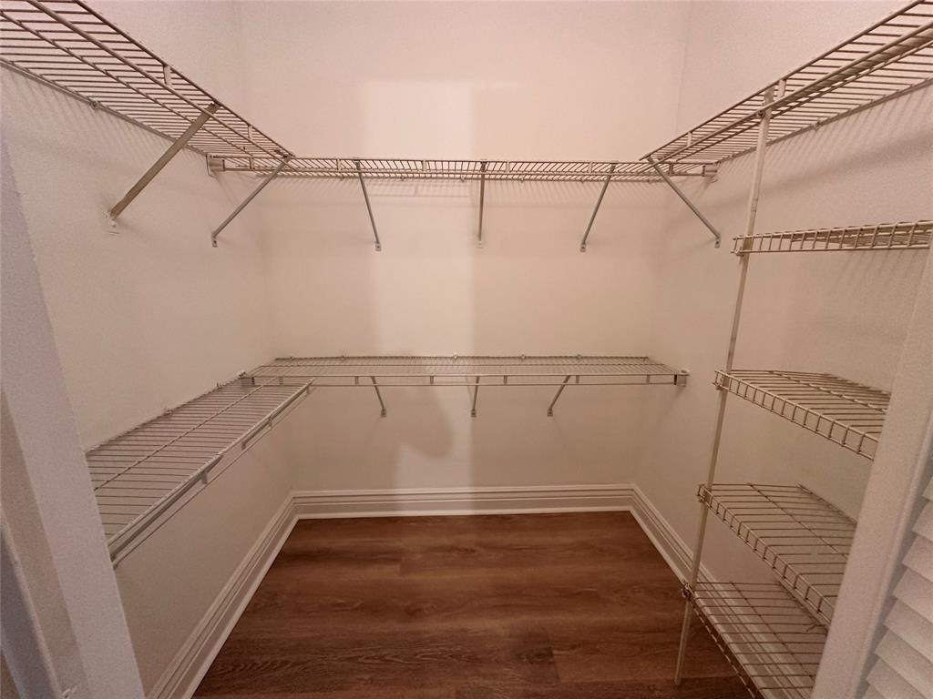 5661 Riverside Drive, Unit 202 Coral Springs, FL 33067 - Photo 16 of 25 a view of a room with racks on the wall