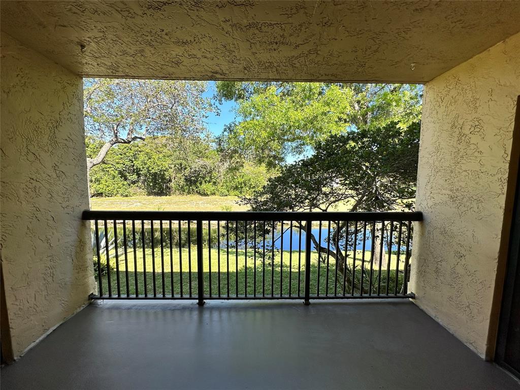 5661 Riverside Drive, Unit 202 Coral Springs, FL 33067 - Photo 2 of 25 a view of a balcony