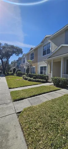 a view of big yard in front of a house