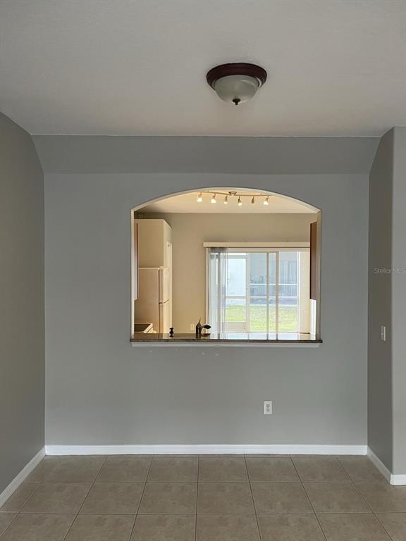 3426 High Hampton Circle Tampa, FL 33610 - Photo 6 of 27 a view of a living room with a large window