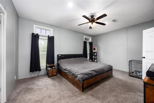 a bathroom with a shower and a toilet