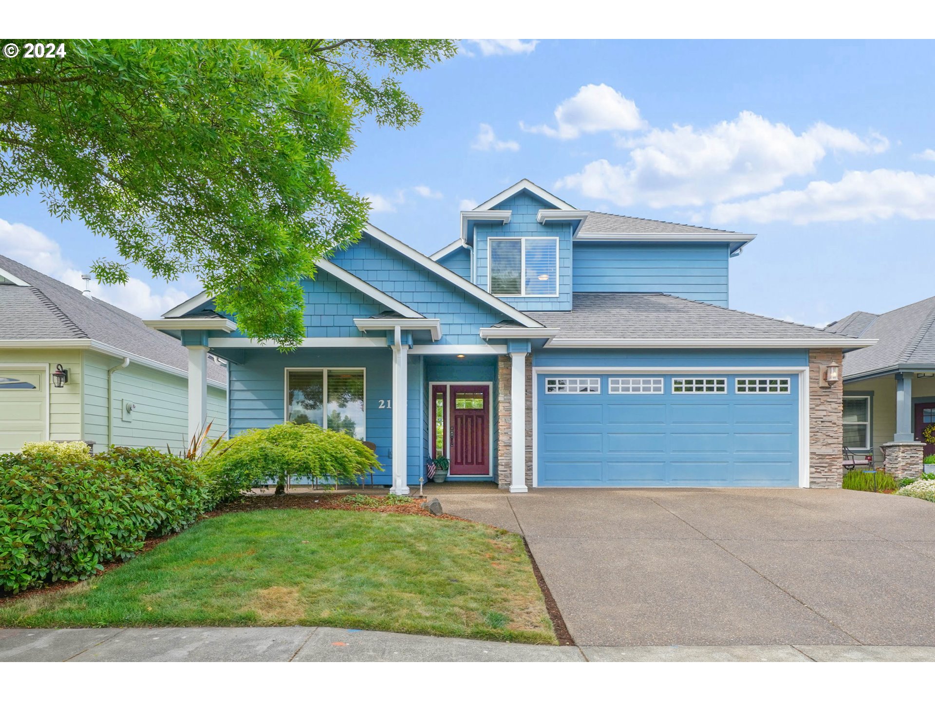 a front view of a house with garden