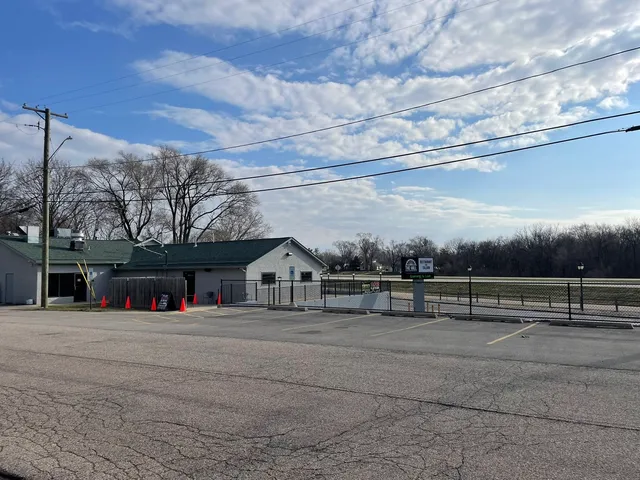 a view of fountain in front of house