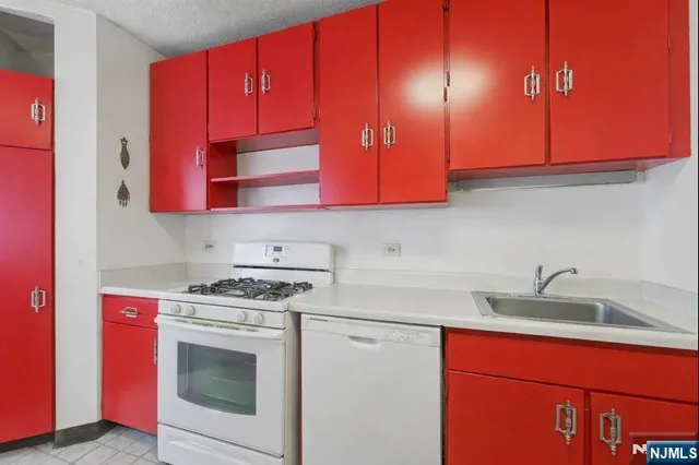 a living room with furniture and large window