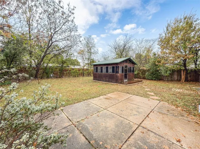 a view of house with outdoor space