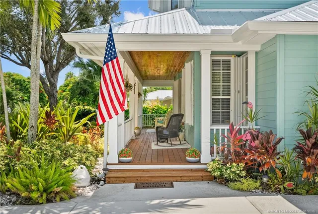 a front view of a house with a porch