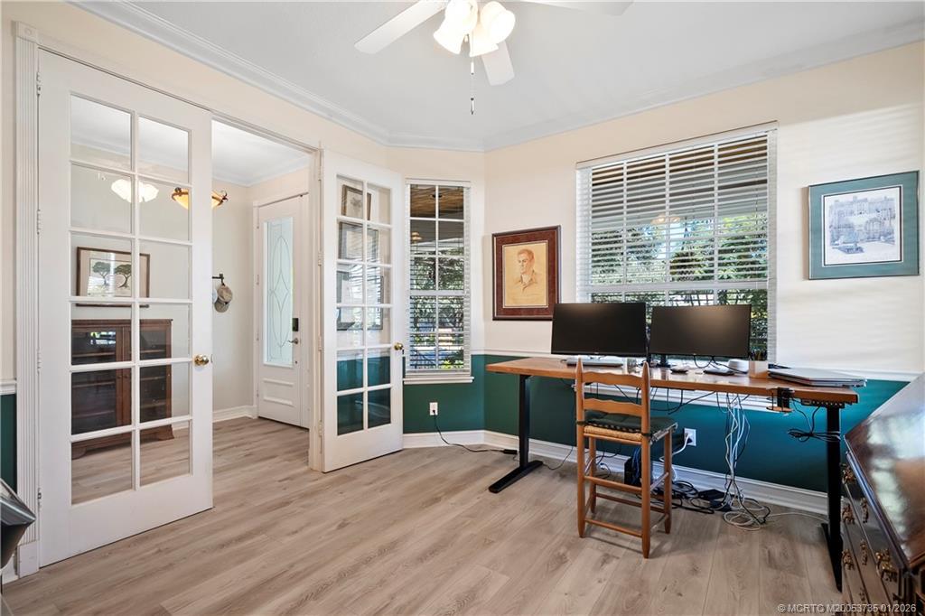 4 Lantana Lane Sewall's Point, FL 34996 - Photo 21 of 47 a view of a workspace with furniture and a window