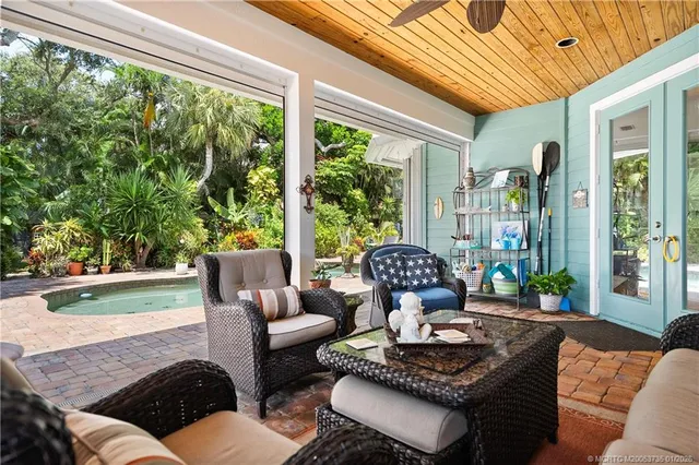 a outdoor living space with furniture and garden view