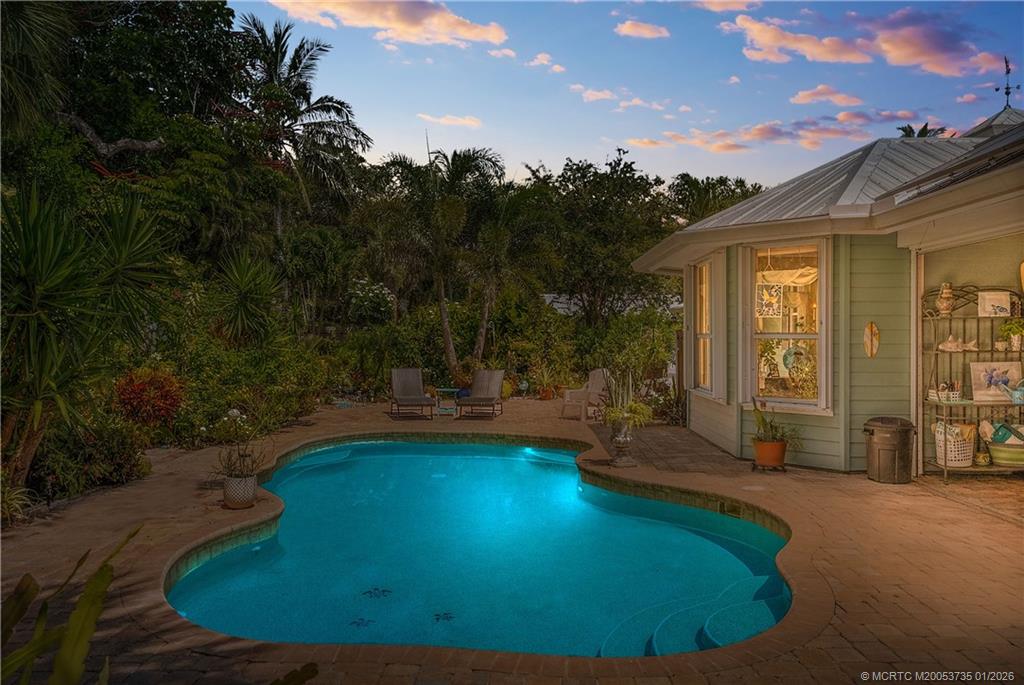 4 Lantana Lane Sewall's Point, FL 34996 - Photo 37 of 47 a view of a swimming pool with an outdoor space
