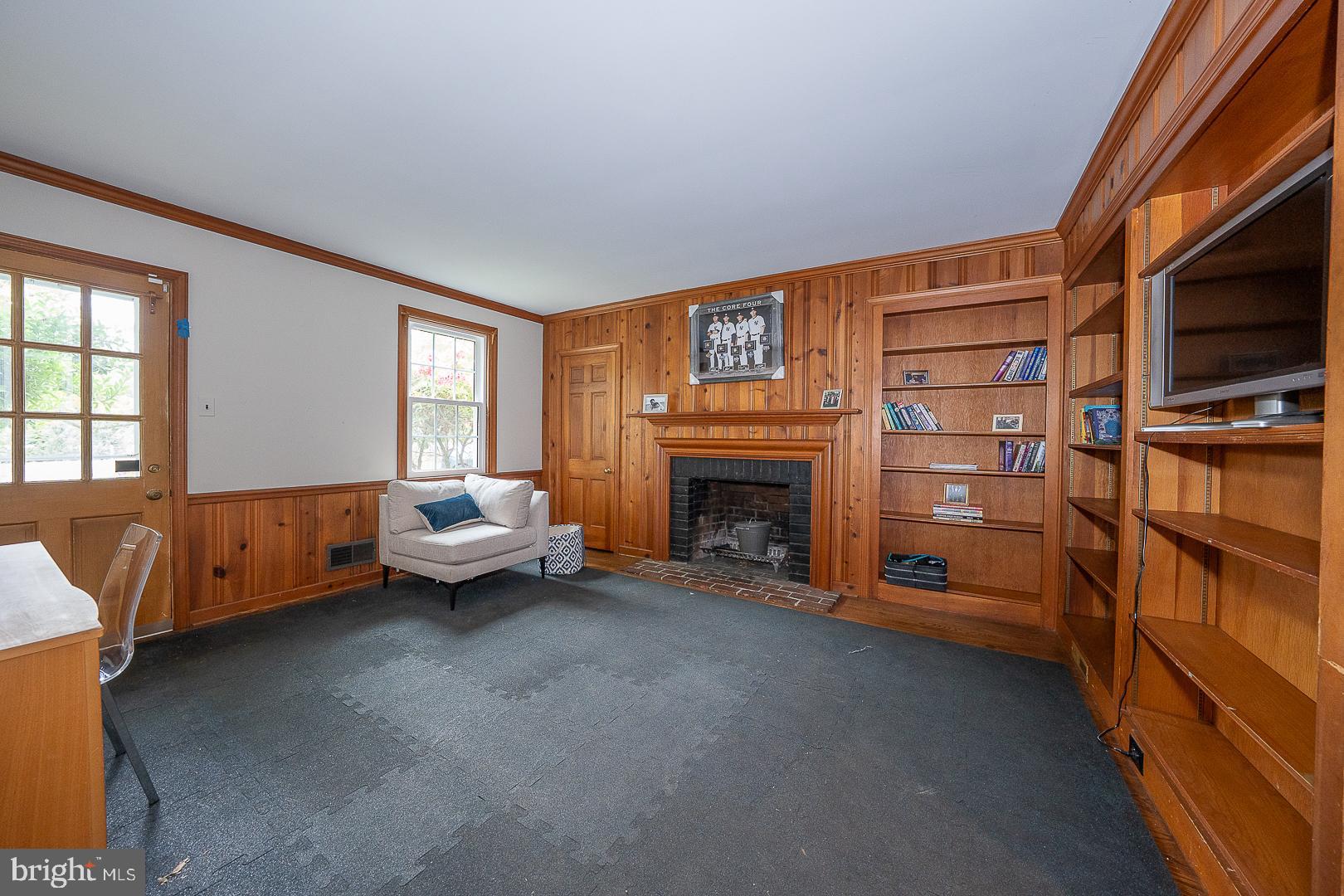 538 Conestoga Road Villanova, PA 19085 - Photo 16 of 39 a living room with furniture and a fireplace