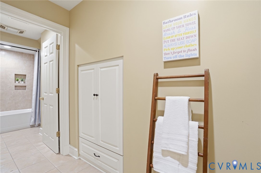 12123 Deer Ridge Court Ashland, VA 23005 - Photo 47 of 63 a view of a hallway with wooden floor and closet