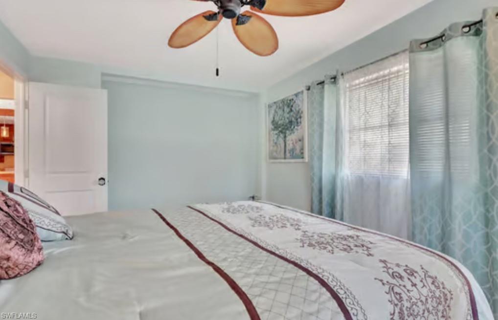 116 Capri Boulevard Naples, FL 34113 - Photo 19 of 29 Bedroom with a ceiling fan