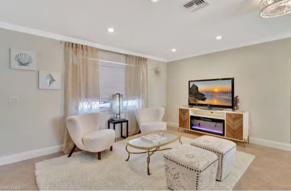 116 Capri Boulevard Naples, FL 34113 - Photo 2 of 29 Living room featuring recessed lighting, baseboards, and visible vents