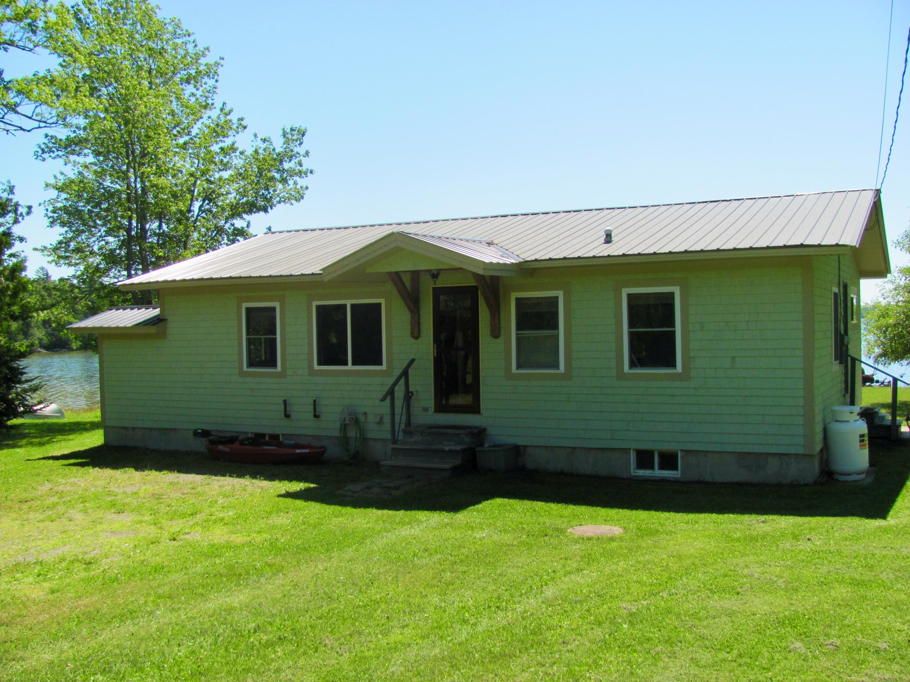 155 Deering Lake Road Orient, ME 04471 - Photo 1 of 66 front 16