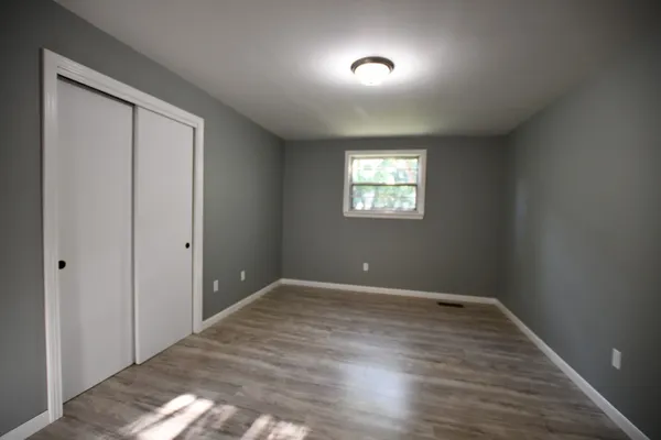 a view of an empty room and window
