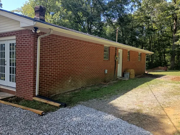 a view of a back yard of the house