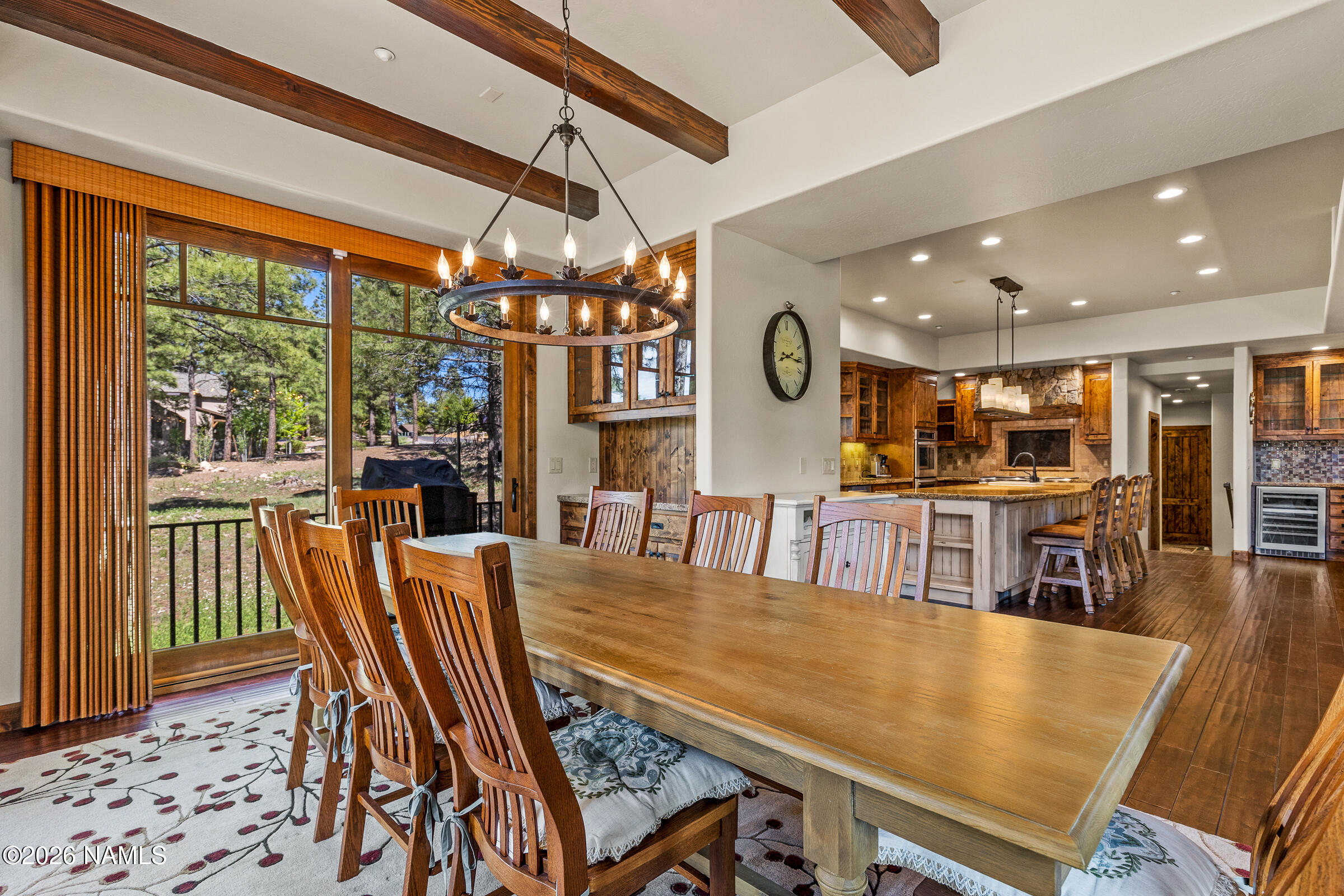 2214 East Del Rae Drive Flagstaff, AZ 86005 - Photo 15 of 45 a view of a dining room with furniture window and outside view