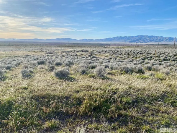 a view of an outdoor space and a mountain view
