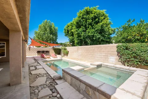 a view of a patio with chair and table