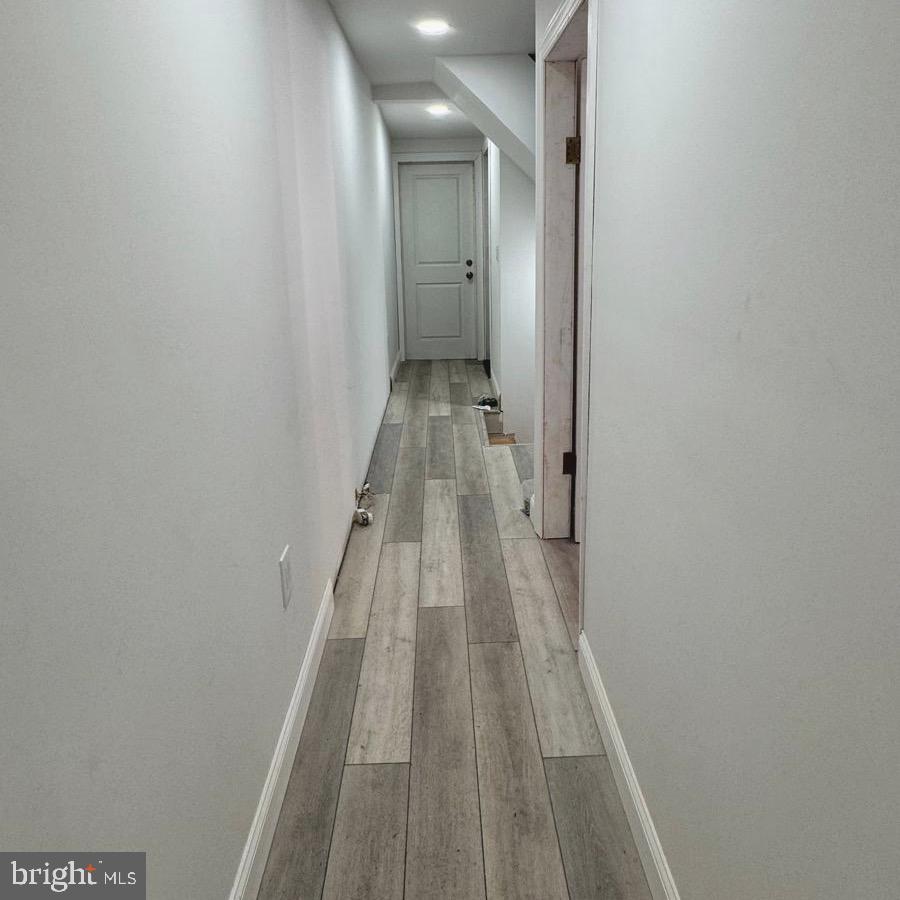 1040 Scott Street Kulpmont, PA 17834 - Photo 2 of 10 a view of a hallway with wooden floor